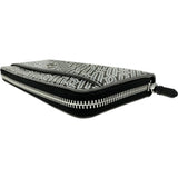 Pre-owned COLE HAAN all-over print zip-around long wallet in gray/black leather. Available at Mako Pawn Shop.




 [Ix] 