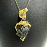 サファイア(原石) 29.4ct ガーネット 計0.41ct ルビー 計0.12ct ペンダントトップ K18ゴールド 18金/K18WGホワイトゴールド 18金 18.1g レディース
【中古】【真子質店】【NN】




【TMaIx】