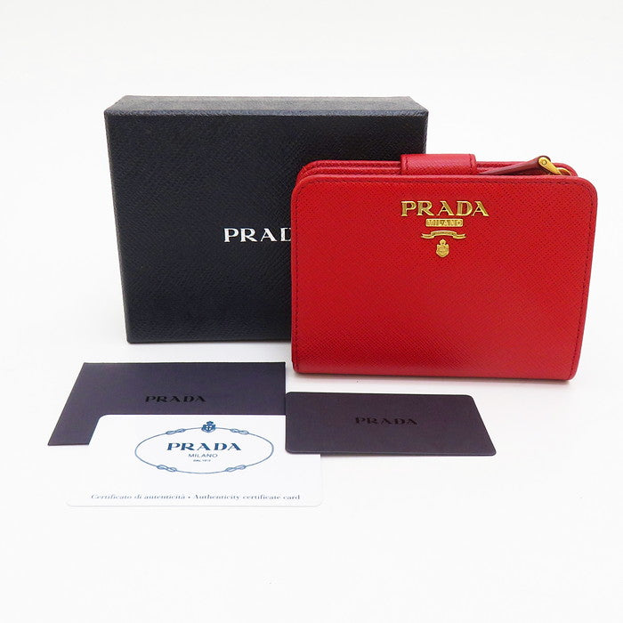 【PRADA/プラダ】 1ML018 サフィアーノメタル 二つ折り財布 サフィアーノレザー FUOCO(赤） ユニセックス【中古】【真子質店】【GN】




【TYD】